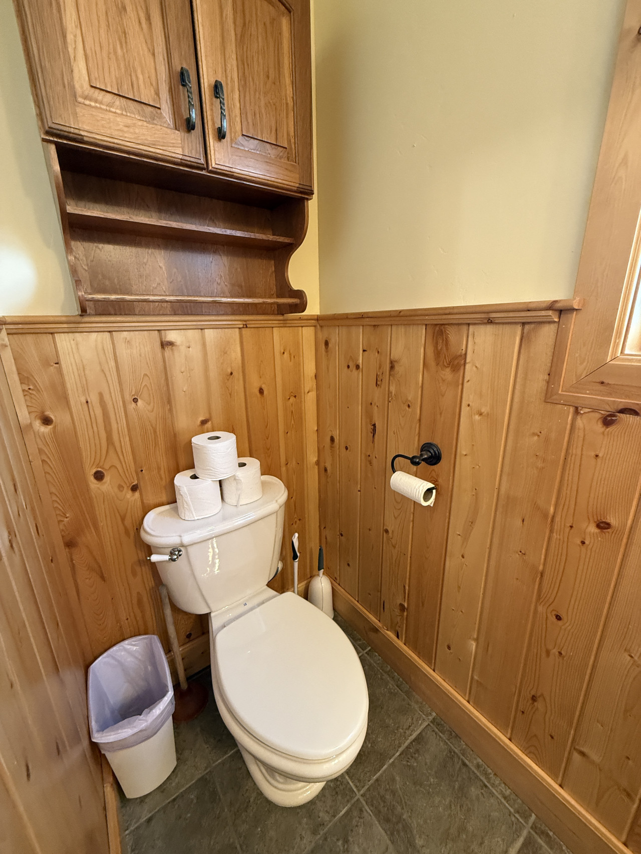 Half bathroom on the main floor across from the master bedroom