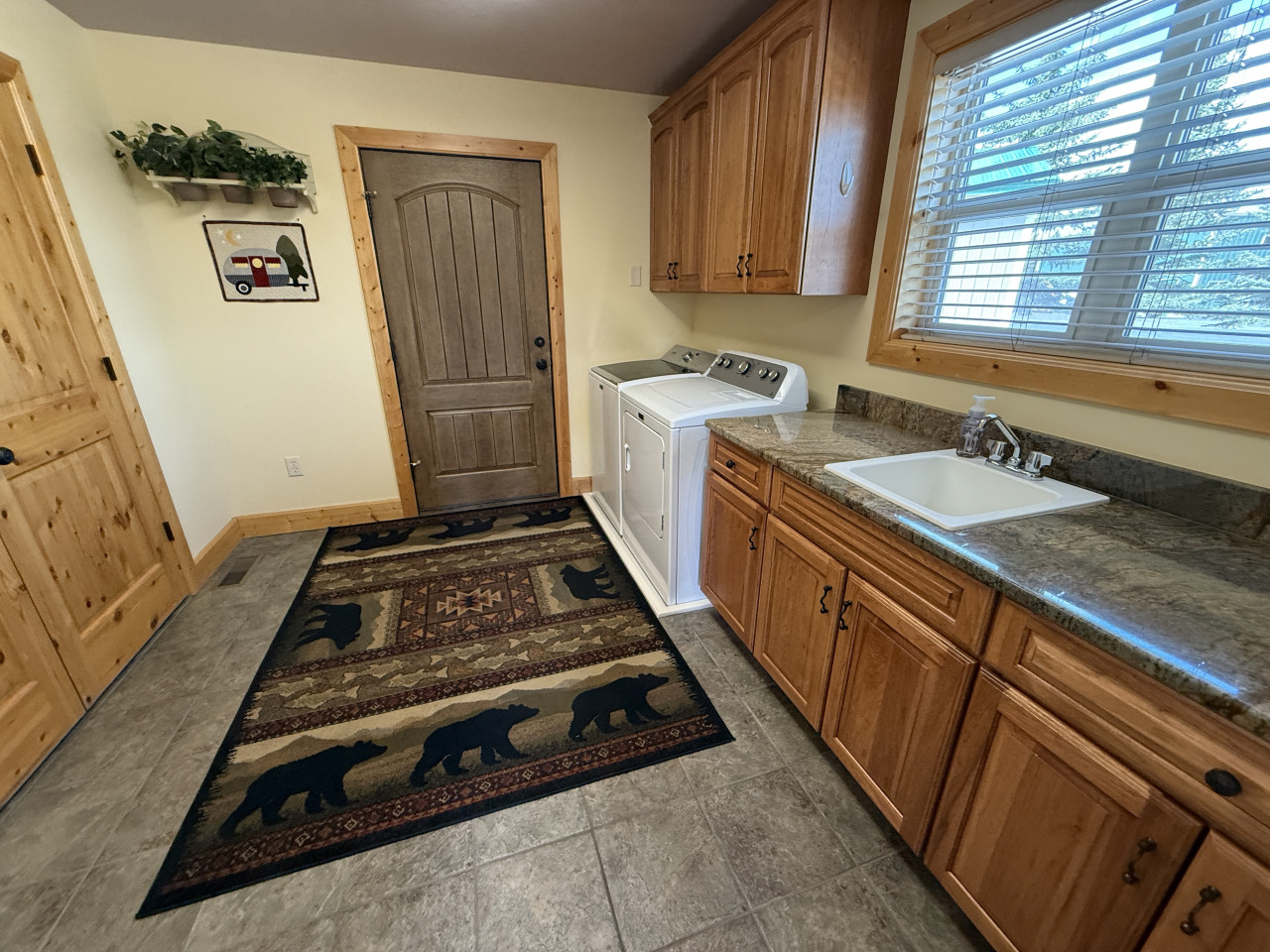 Feel right at home with a washer and dryer in the laundry room off the garage