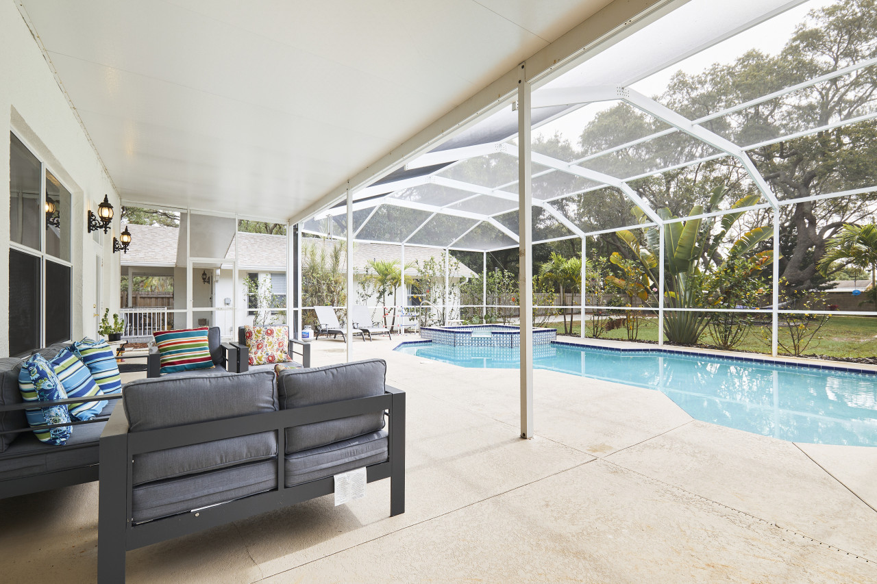 The Oasis Retreat | Heated Pool + Game Room + Basketball + Massive Yard | Near Beach & Golf thumbnail 7