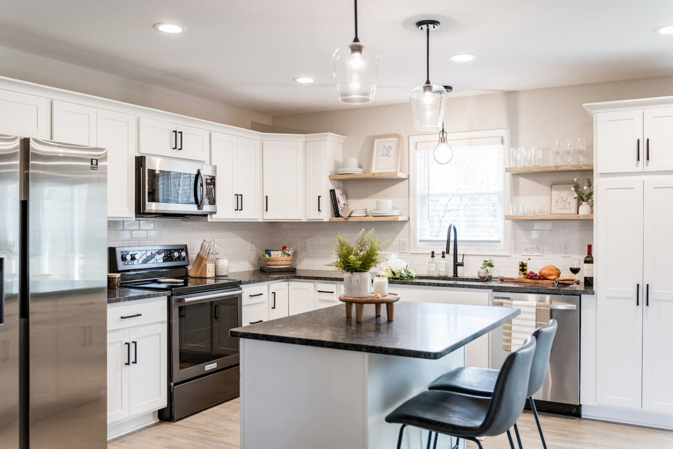 This stylish and inviting space features sleek countertops, top-of-the-line appliances, and ample storage for all your cooking needs.