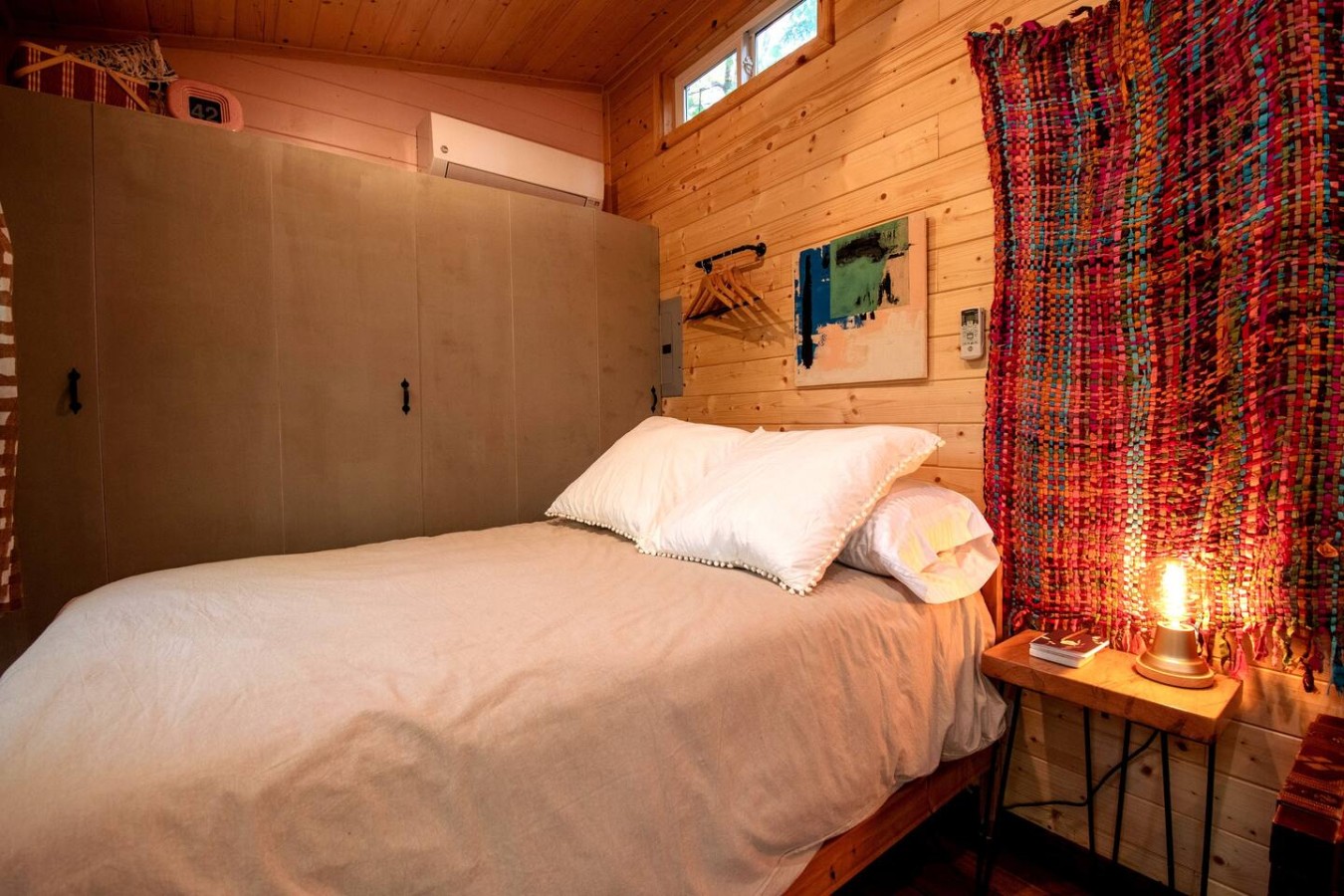Catch a view of the forest from your cozy full size, memory foam bed.