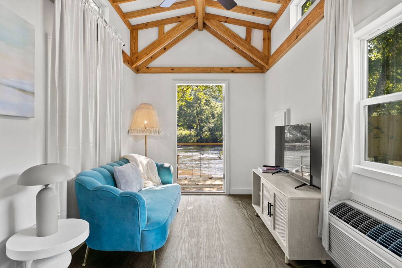 "Gorgeous scenery, lovely adorable little tiny house. Super comfortable bed. Tv worked great, enjoyed some time on the porch listening to the river babble. Very very relaxing!!!" - Chrissy
