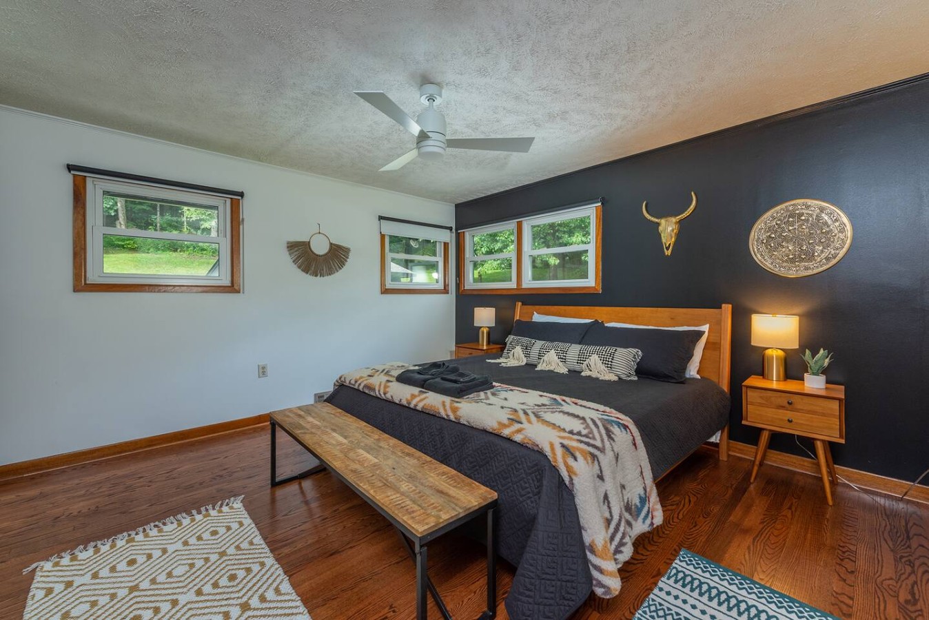 Spacious primary bedroom with king bed