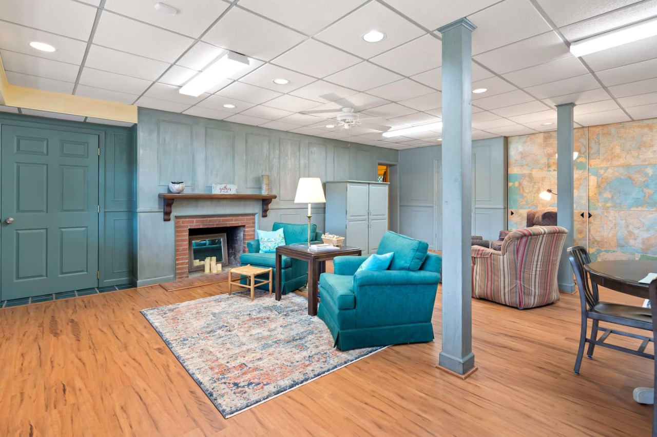 Our cozy living room with a crackling fireplace. The perfect spot to unwind after a long day