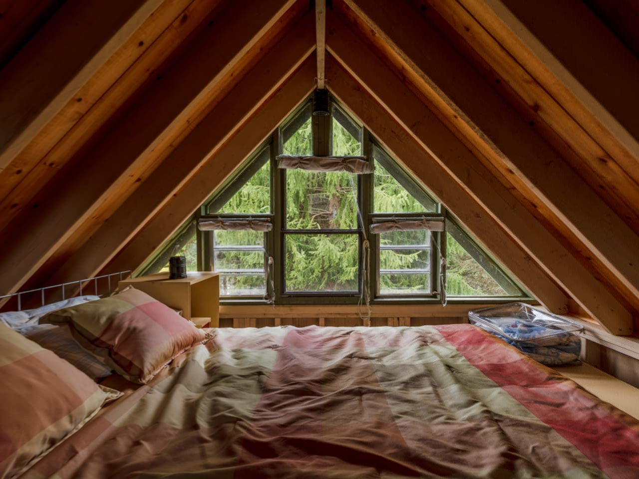 A cozy full bed in the loft
