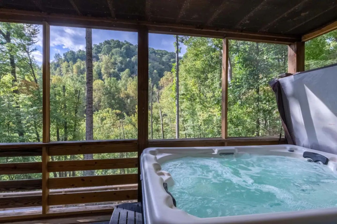 Gorgeous view from the hot tub inside one of our screened-in porches!