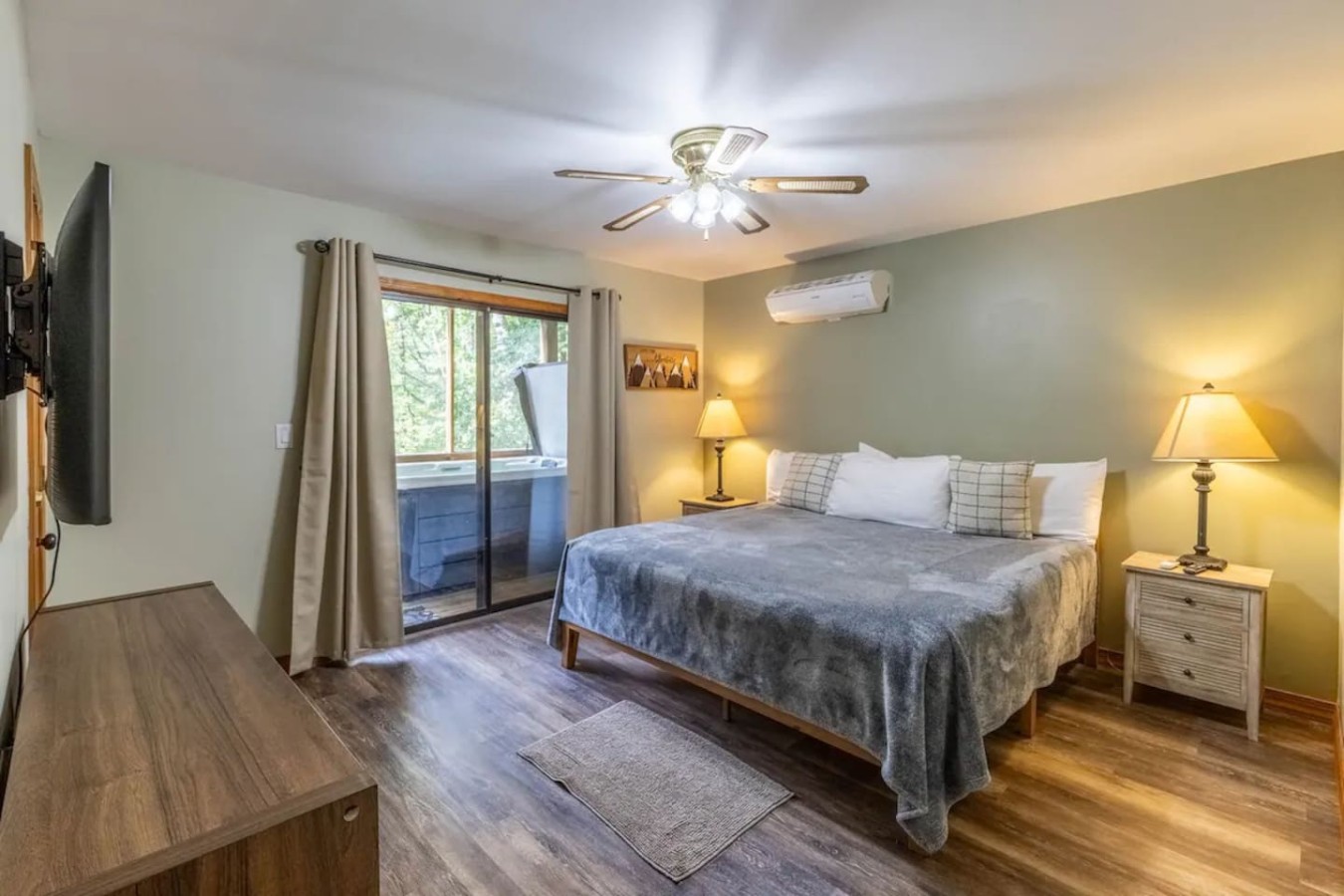 Bedroom #1 with king bed and just steps away from the hot tub!