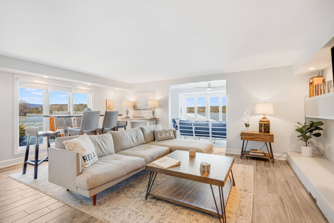 Open living room with views of the water and a Roku TV and games available!