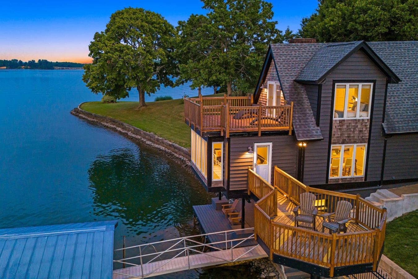 Breathtaking views, peaceful, and an experience you won't forget. This stunning home literally hangs over Lake James. With views of the mountains, hiking close by, and a easy day drip into Asheville, it's the best of all worlds!