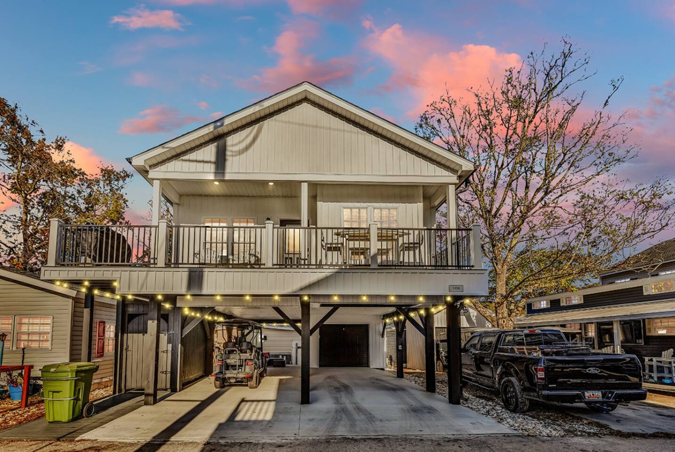 Discover the perfect blend of comfort and adventure at this beautiful home with a golfcart.