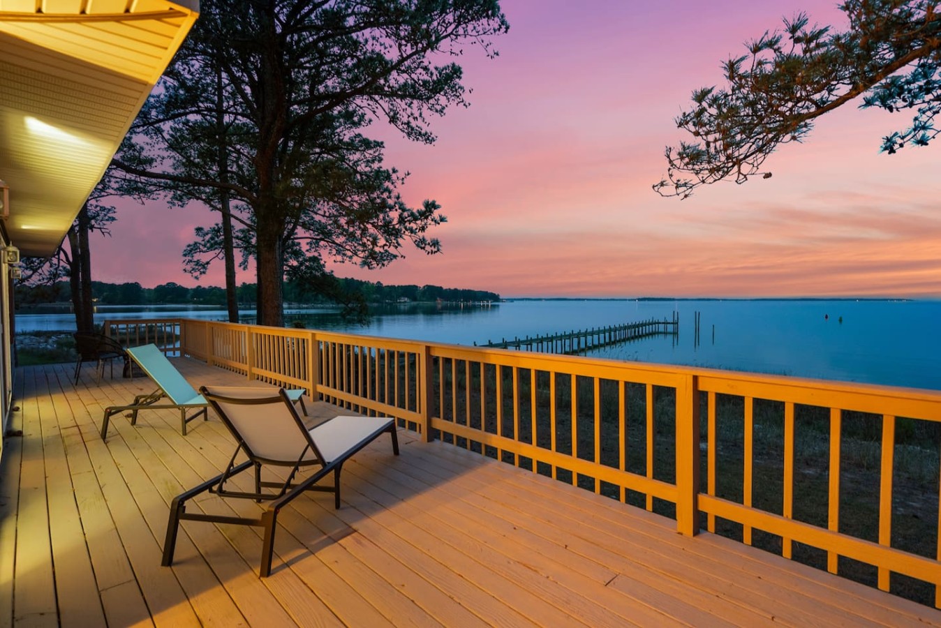 Imagine sipping your favorite drink while lounging in the chair on this gorgeous deck, soaking in the stunning water views!