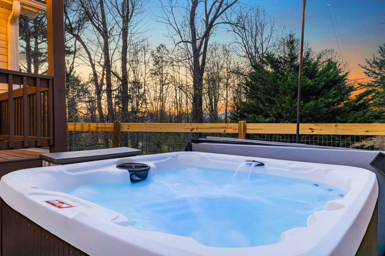 Unwind in this bubbling retreat with stunning sunset views