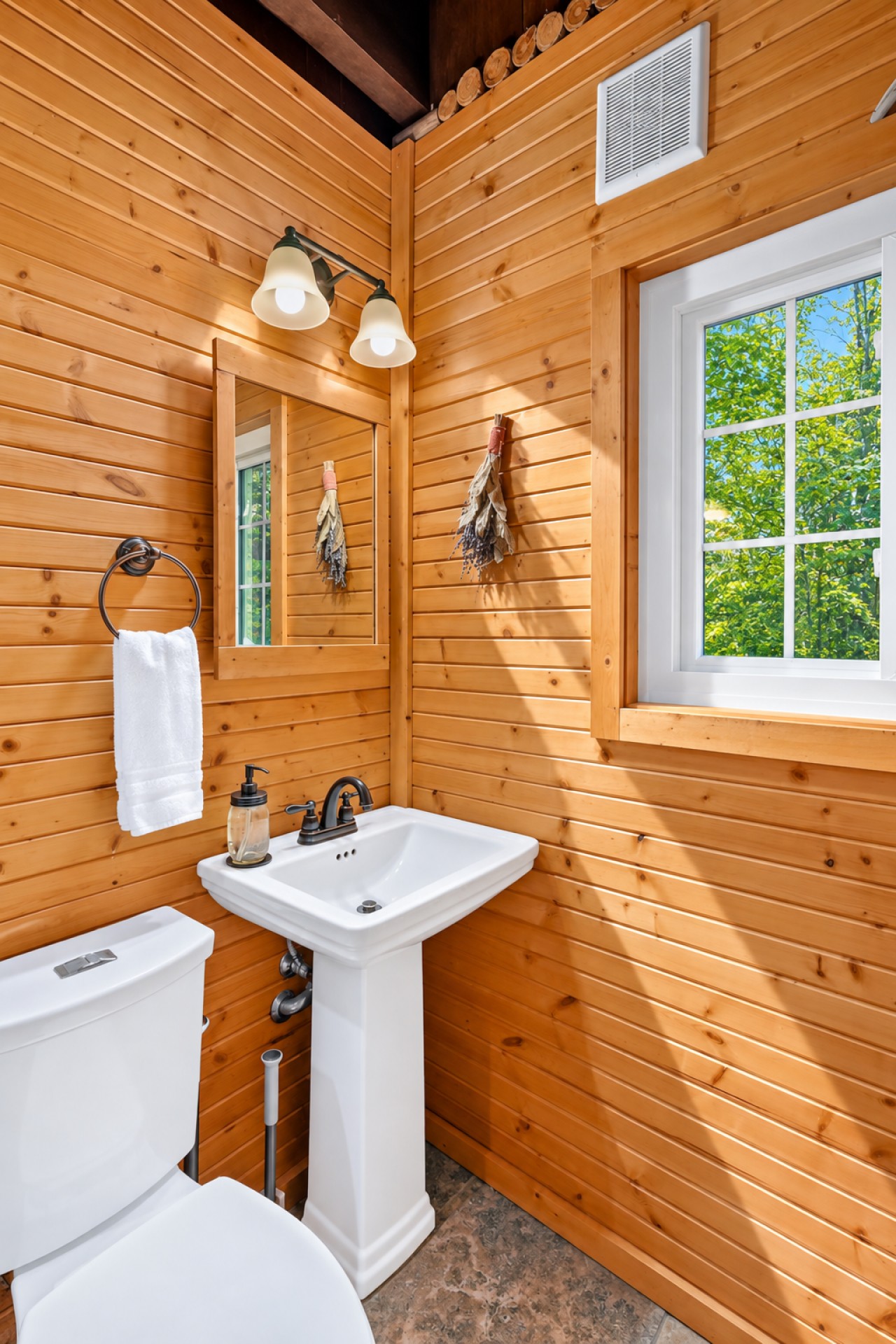 Chalet Getaway: Wood-paneled bathroom vanity