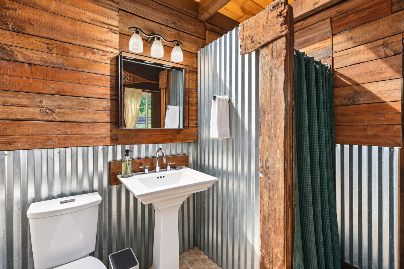 Chalet Getaway: Bathroom vanity with metal wall accents