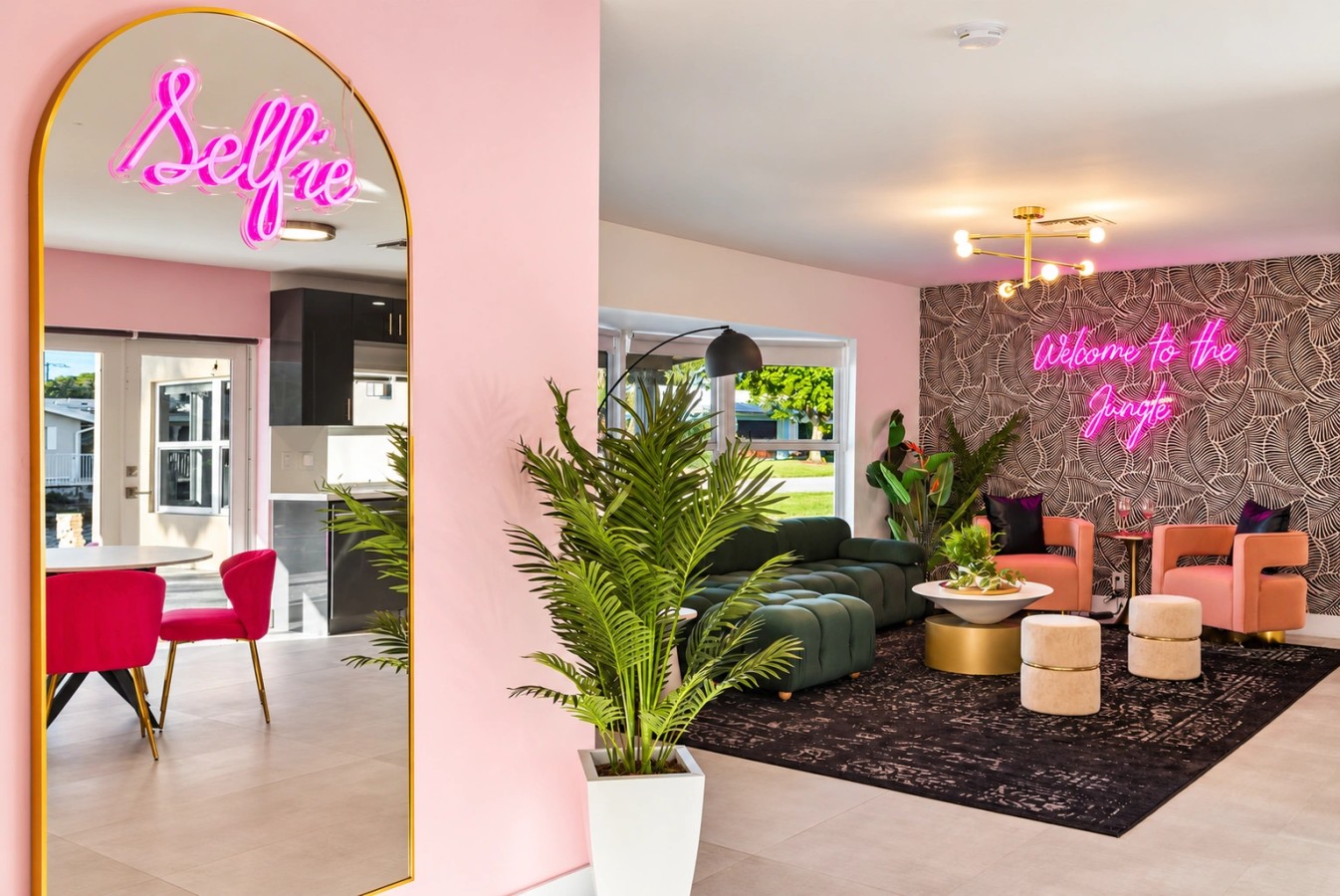Pink get-ready room with mirrored styling stations
