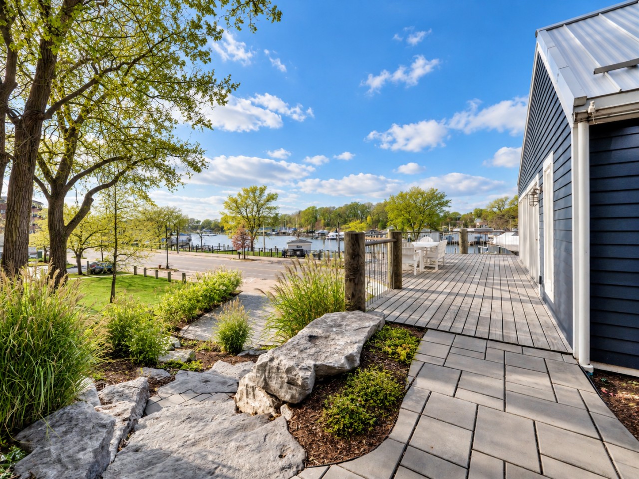 River-facing deck and landscaped outdoor spaces