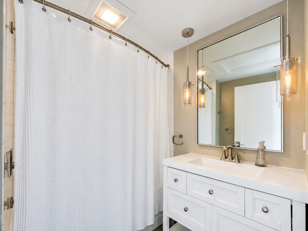 Bathroom with tub and shower