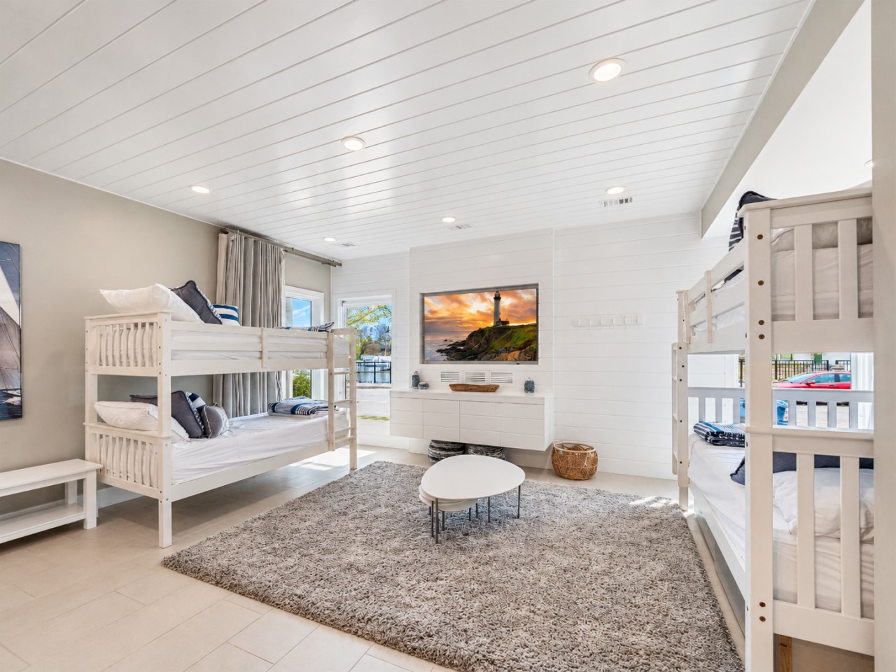 Bunk sleeping area in the shared lower-level space