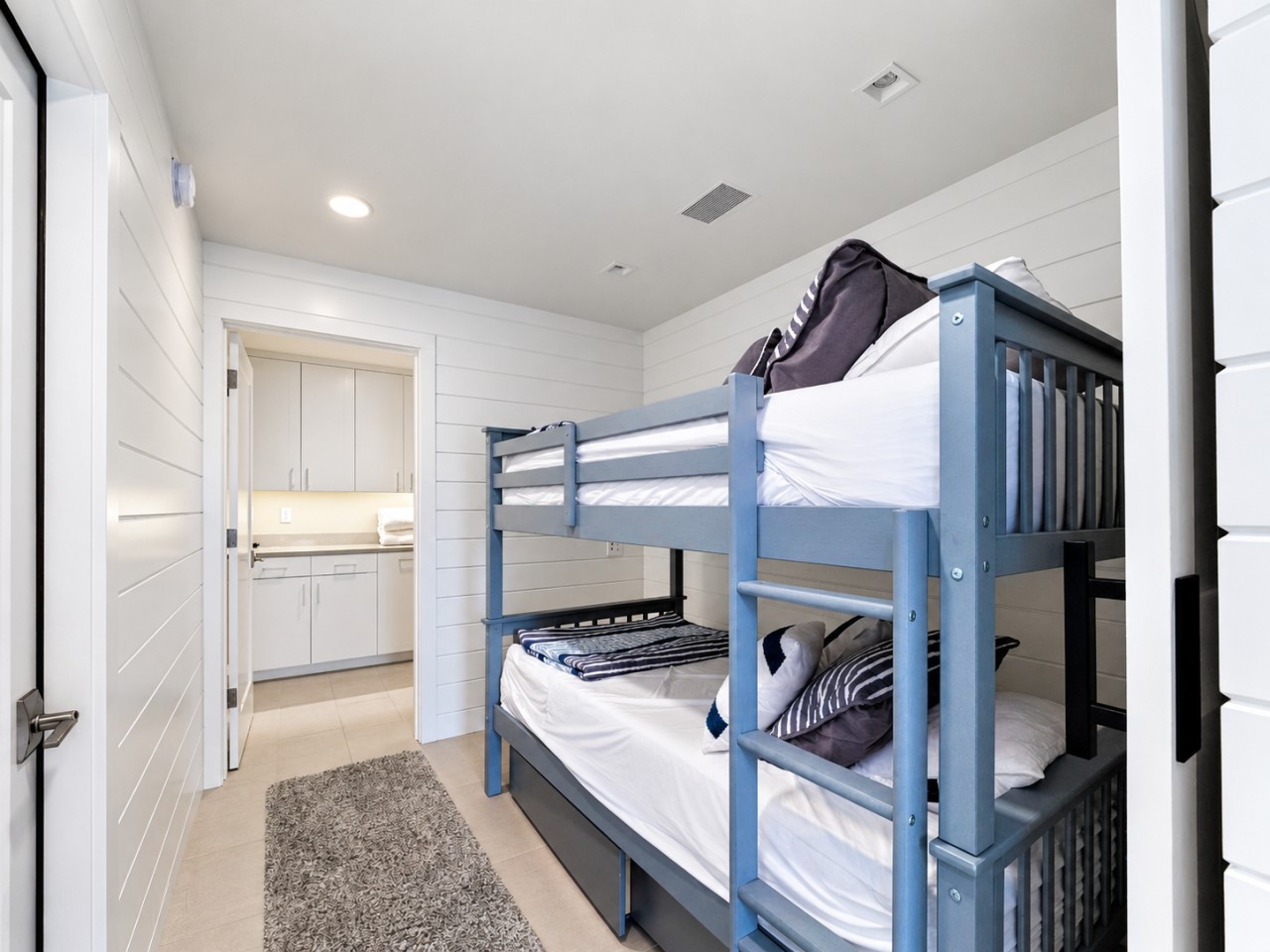 Twin bunks tucked into an alcove