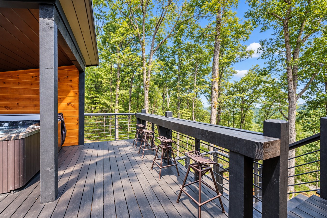 Sky High: Deck with hot tub and forest views
