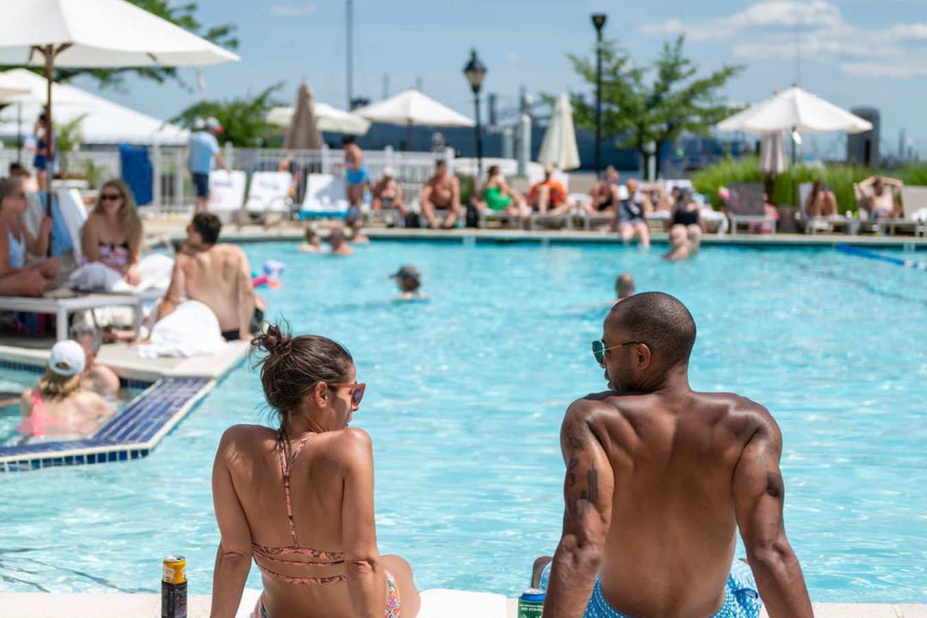 Soak up the sun poolside at the marina's Swim Club — your summer happy place is just steps from the houseboat.