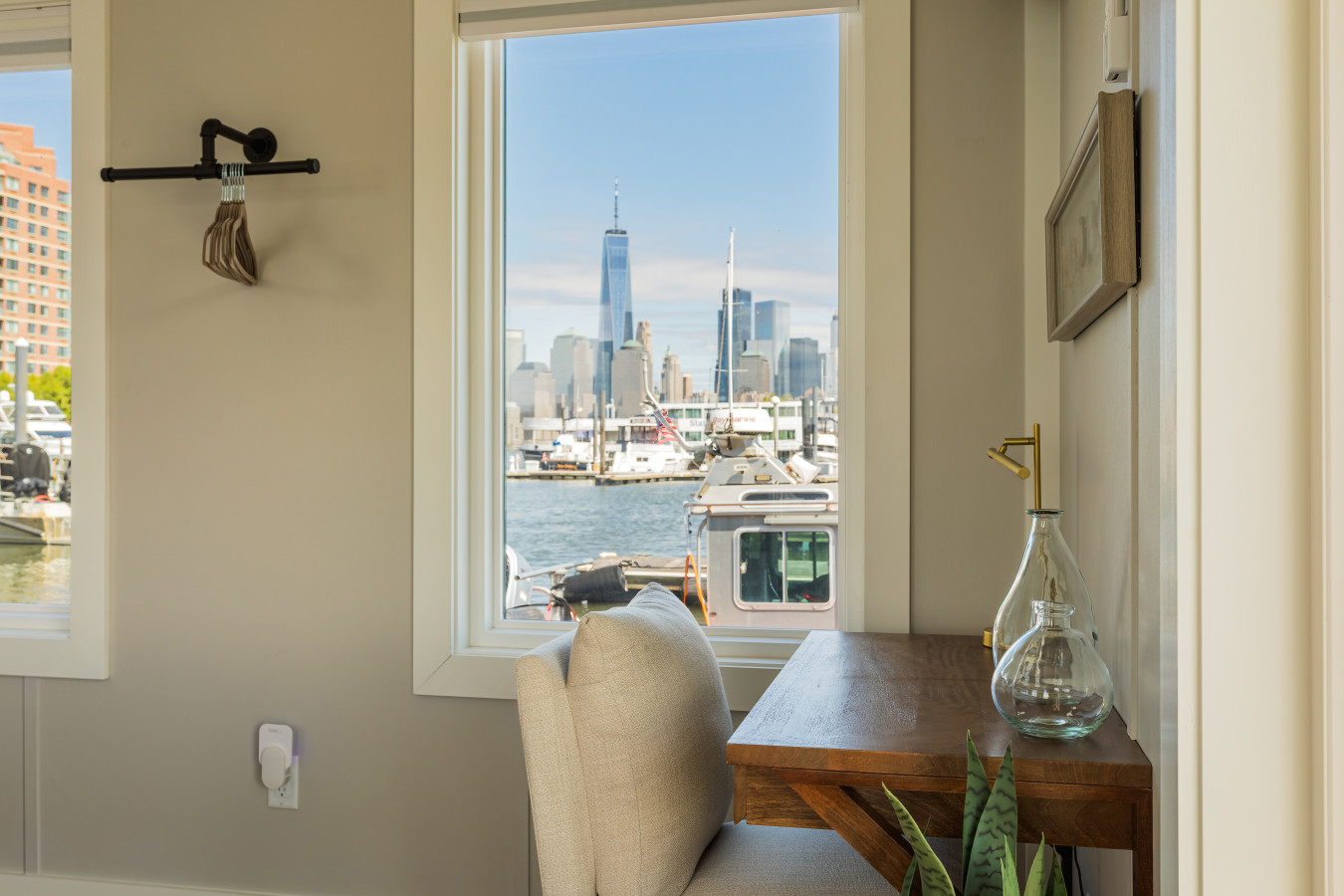 A dedicated workspace in the bedroom puts One World Trade directly in your sightline, making it the most inspiring desk view in the portfolio.