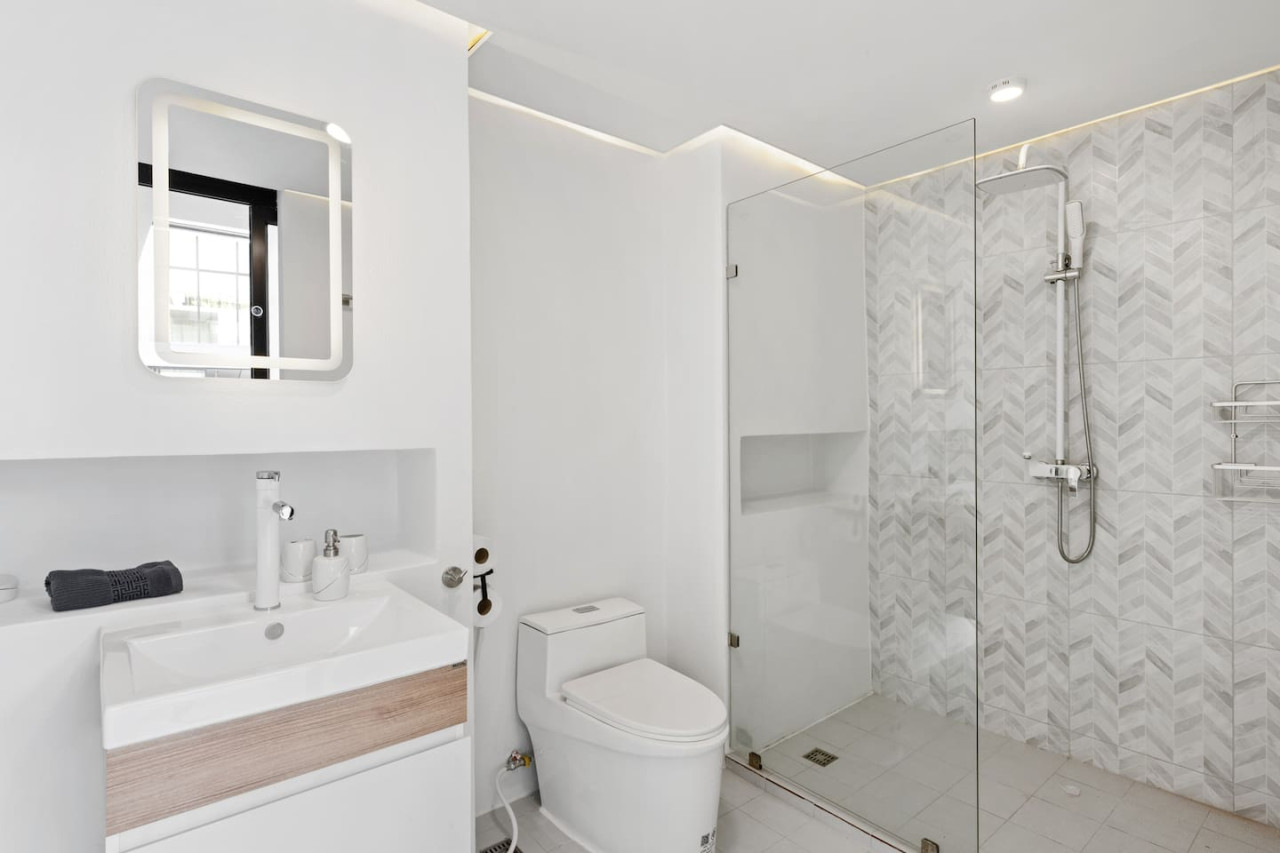 Modern bathroom with rain shower at C'est la Vie, Replay Residence Koh Samui