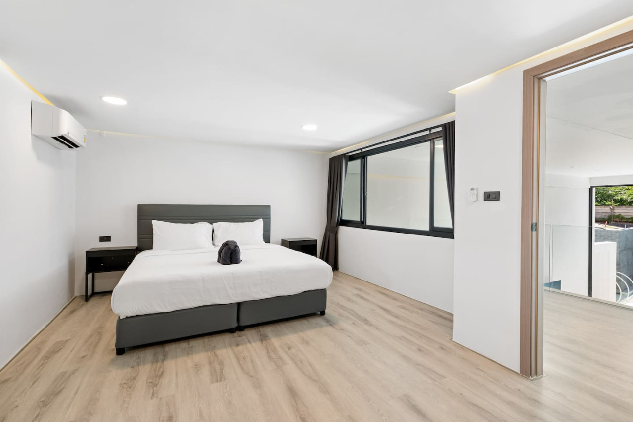 Master bedroom with pool access at C'est la Vie, Replay Residence Koh Samui