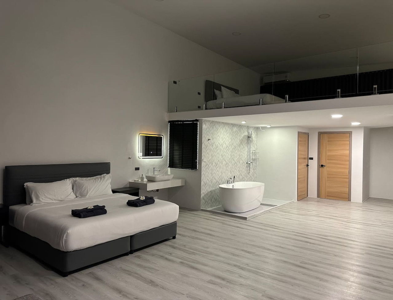 Cozy bedroom retreat with hotel-quality bedding and ambient lighting in Koh Samui villa