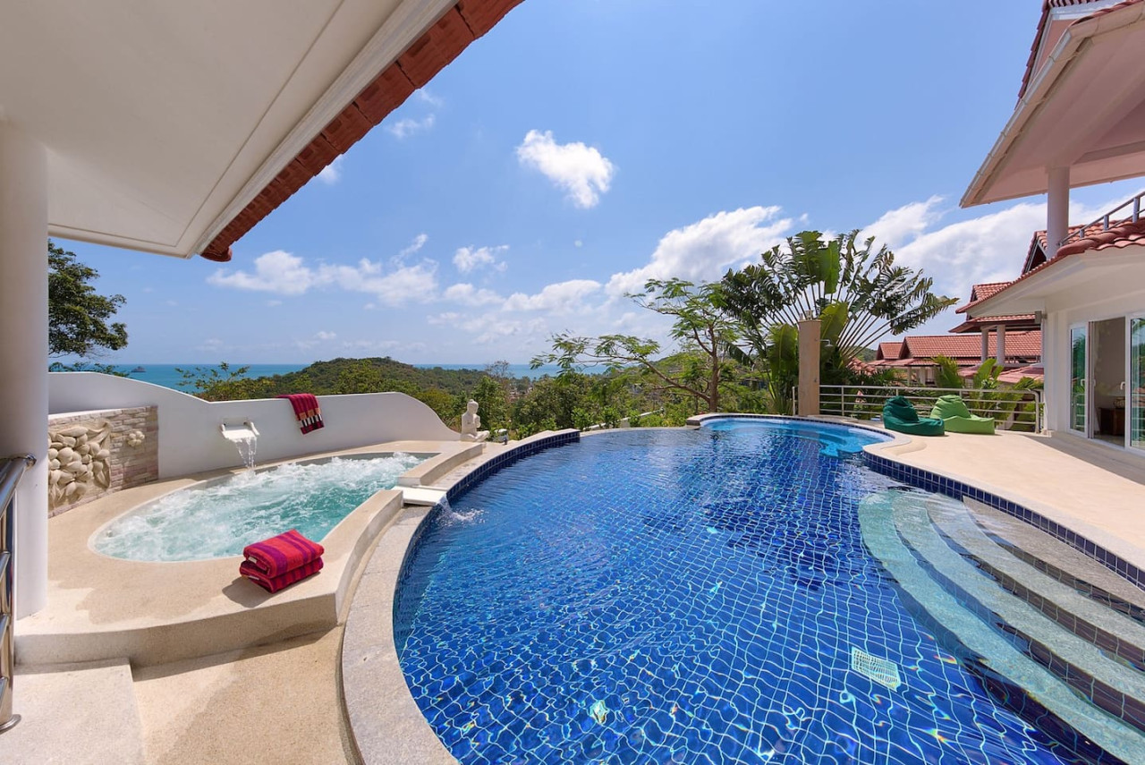 Covered pool terrace with ocean views Thongsong Bay luxury villa Samui