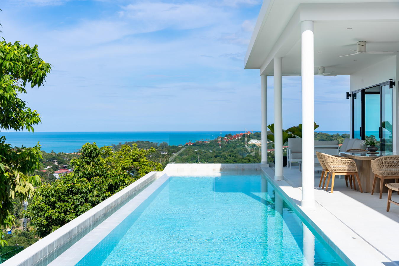 Sleek contemporary villa architecture with infinity pool