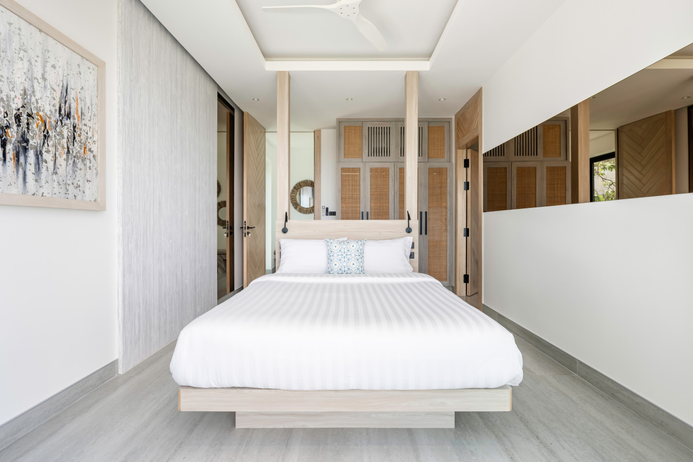 Comfortable guest bedroom with premium white linens