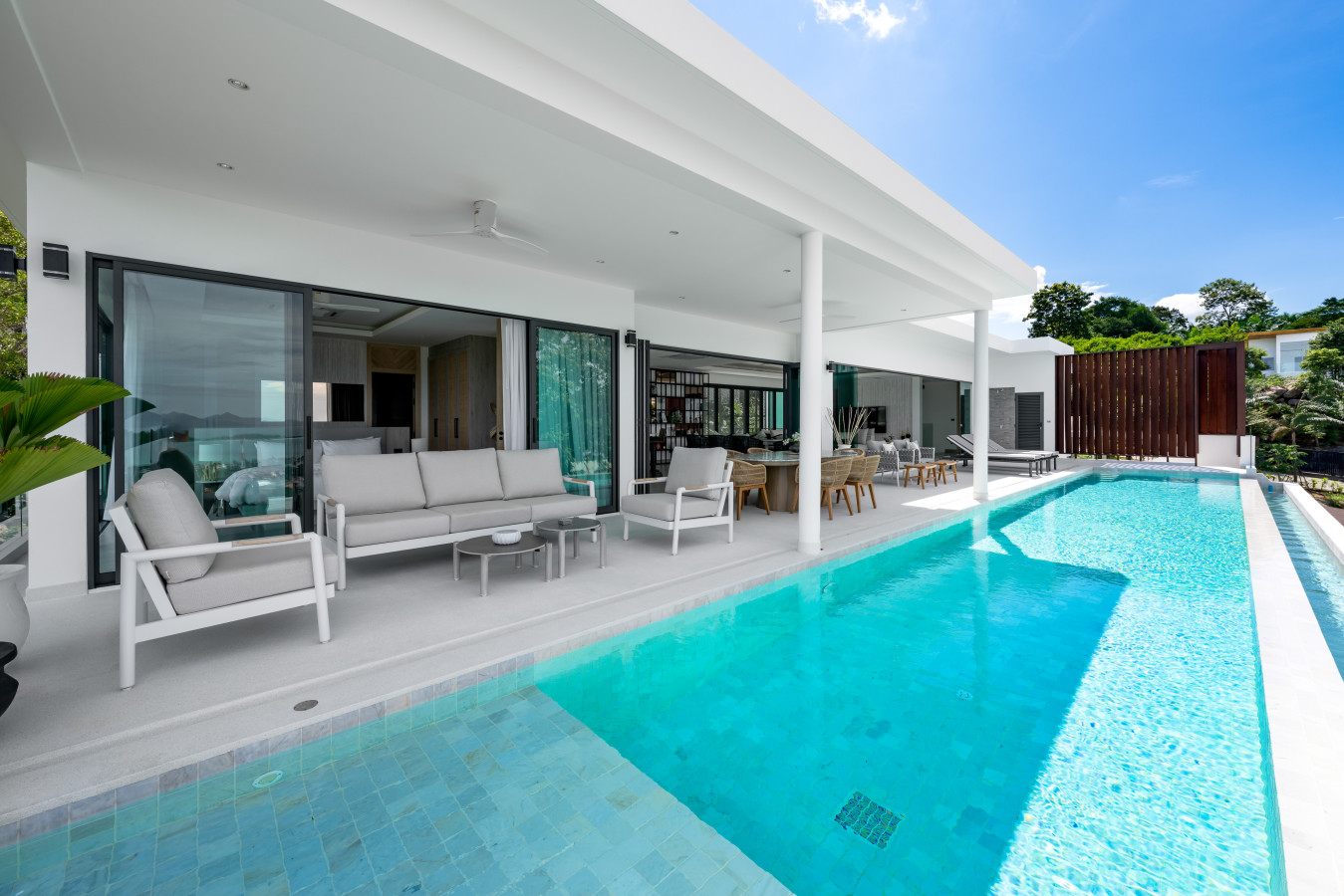 Aerial view of the stunning turquoise infinity pool and sun deck