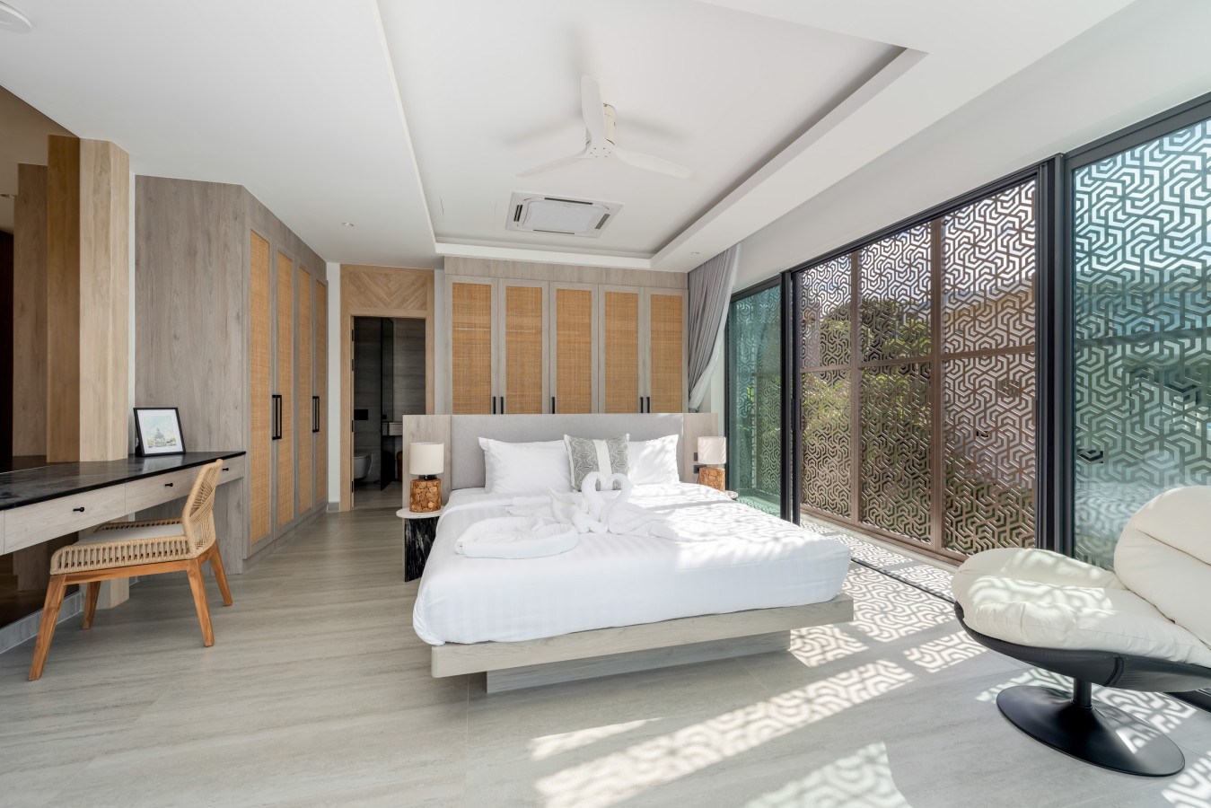 Serene bedroom with dramatic vaulted wooden ceiling
