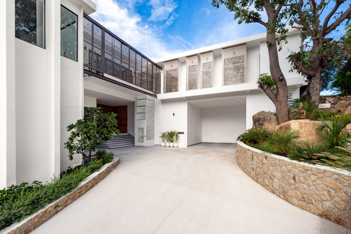 Striking multi-level villa facade with contemporary design