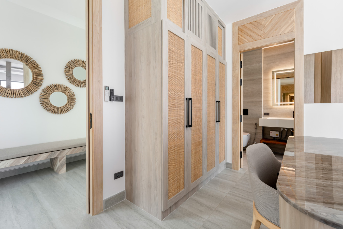 Welcoming villa entrance with decorative wooden doors