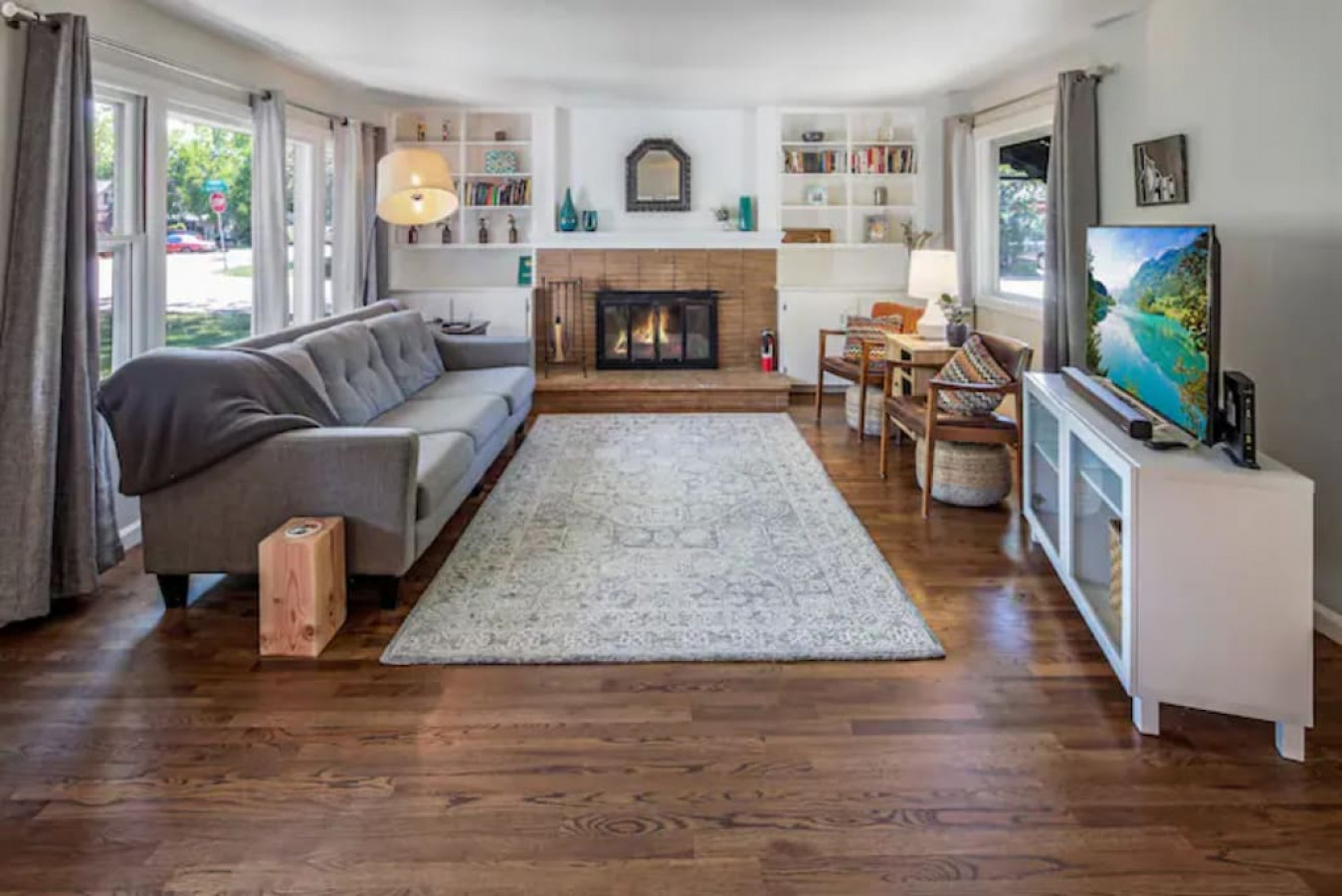 Cozy living room with fireplace and TV