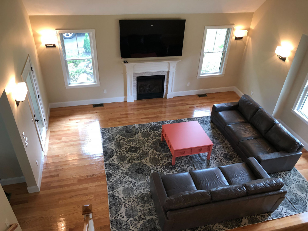 Unwind with your loved ones in the spacious great room, complete with luxurious leather couches, where you can bask in the afterglow of a day at the beach while enjoying entertainment on the impressive 85-inch TV.