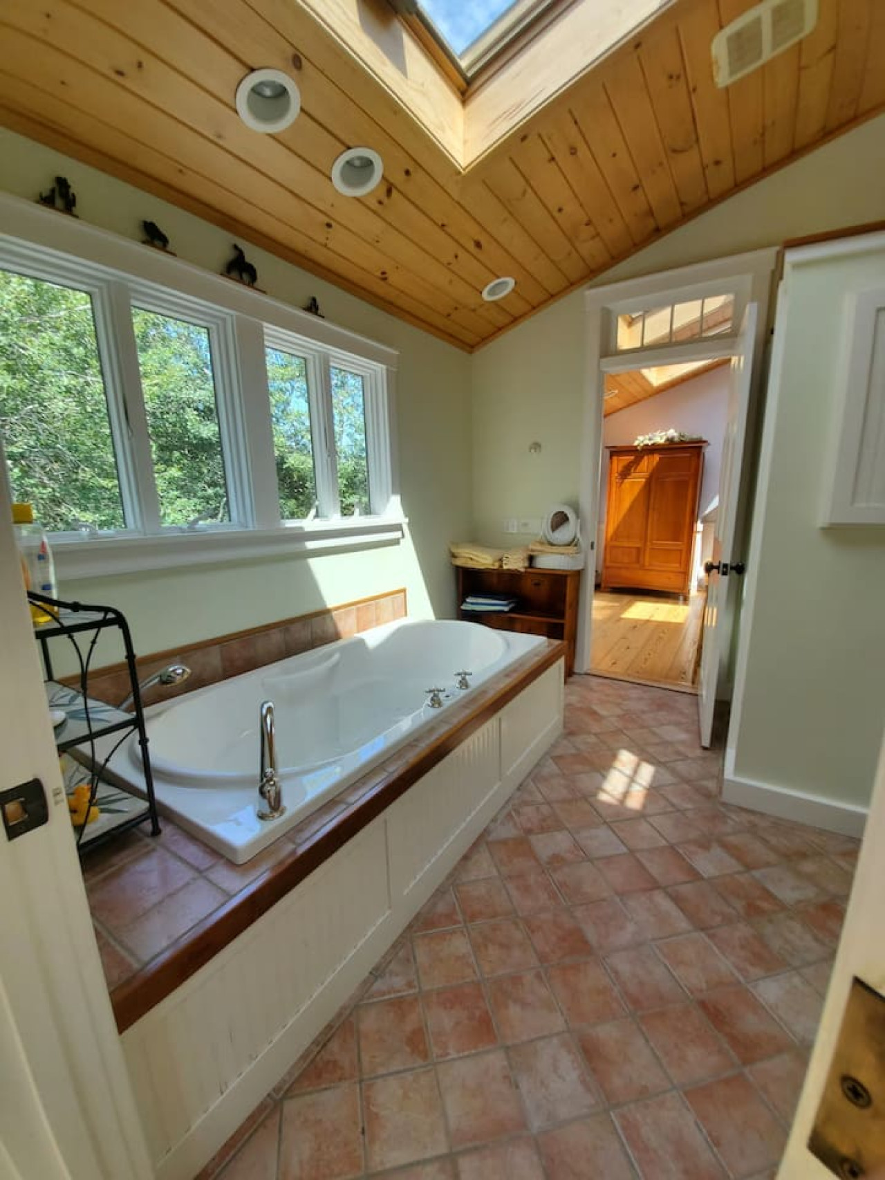Spacious master bathroom featuring a luxurious soaking tub and a sleek walk-in shower—perfect for relaxation and comfort.