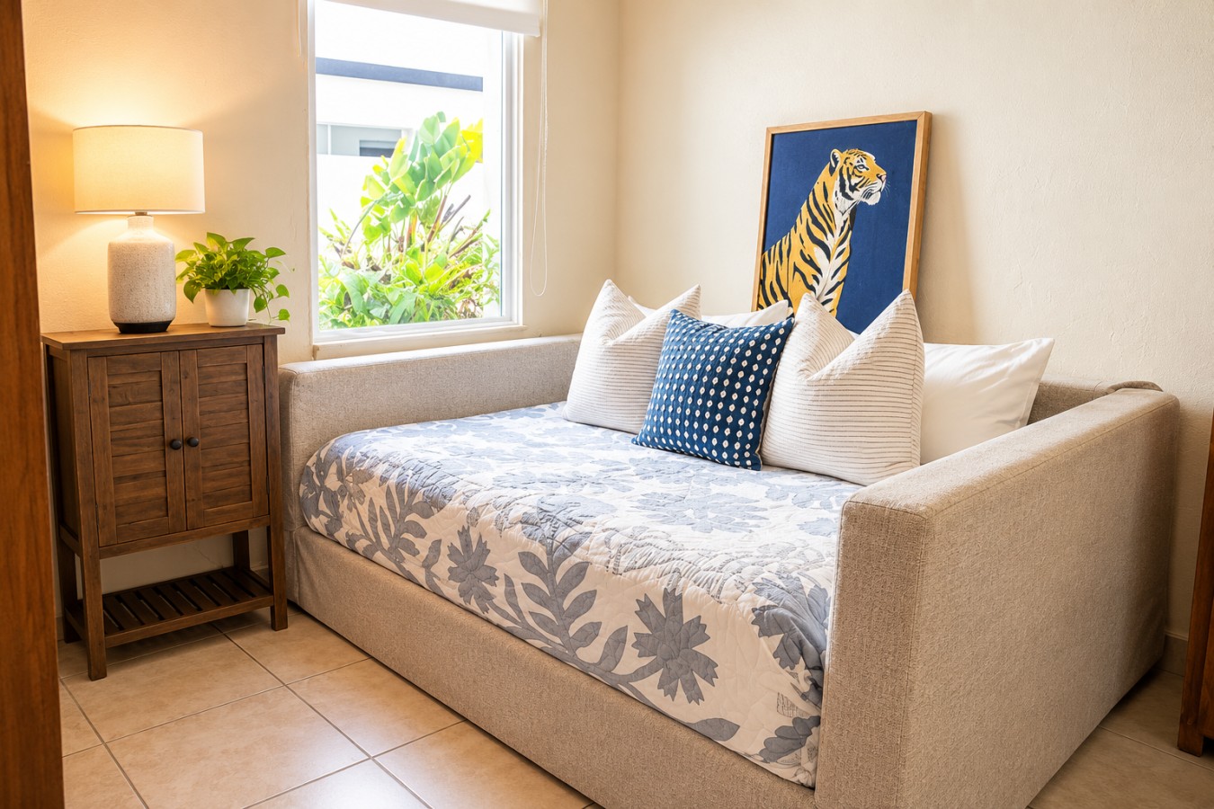 Cozy third bedroom with a full-size daybed, fresh linens and natural light