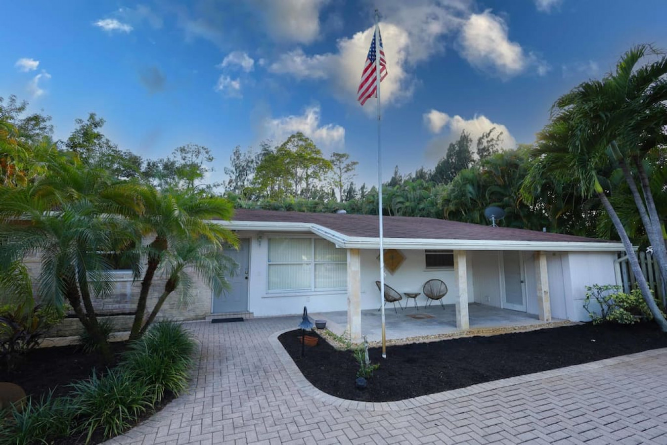 Beautifully landscaped, the house has true curb appeal. Sit on the porch with your coffee and just relax