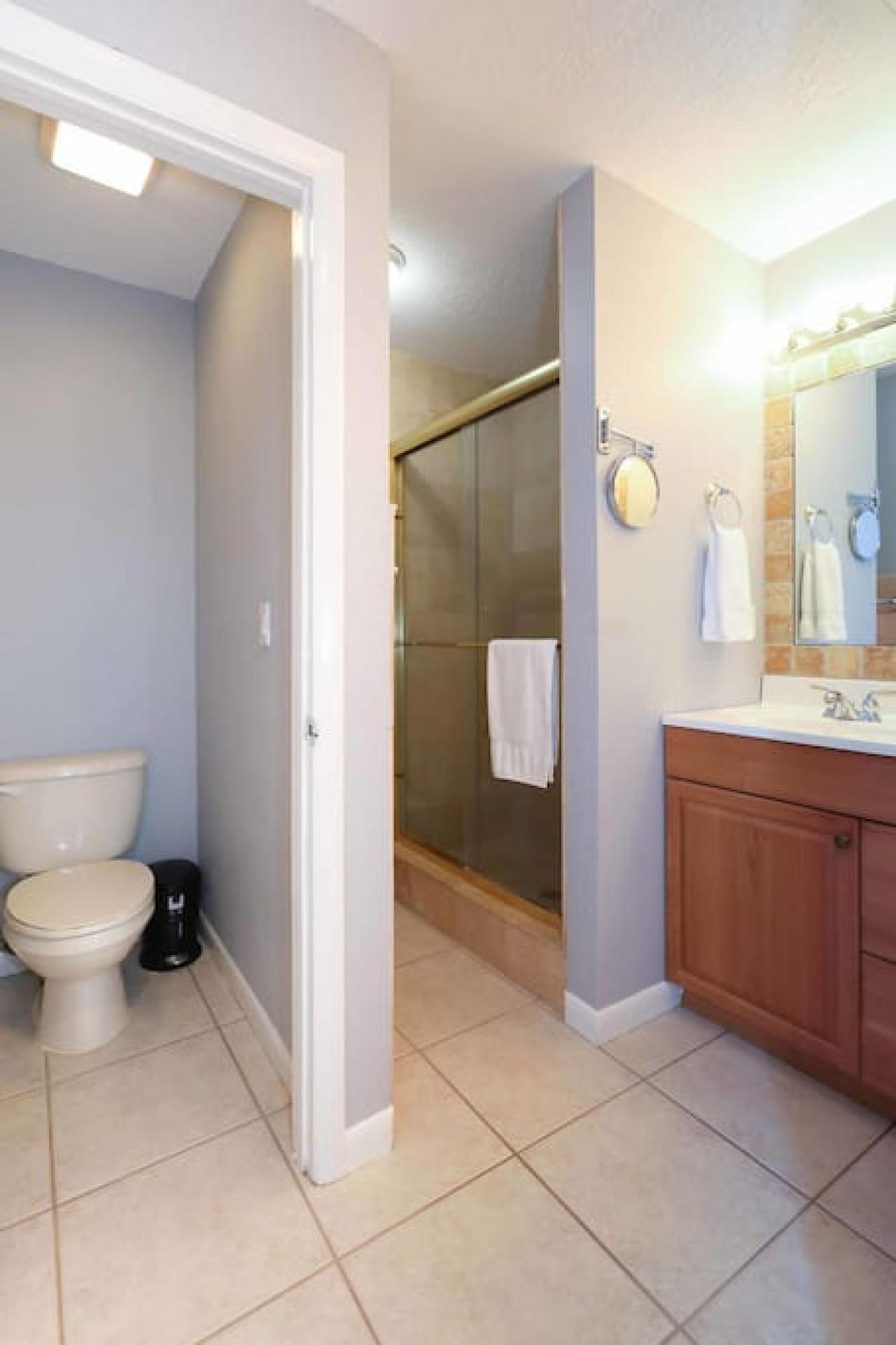 Enjoy complete privacy with a water closet in the primary bathroom, which also features a huge walk-in shower