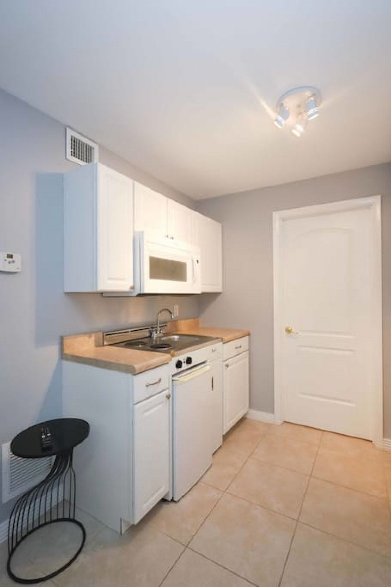 Our studio offers a cute kitchenette for your convenience