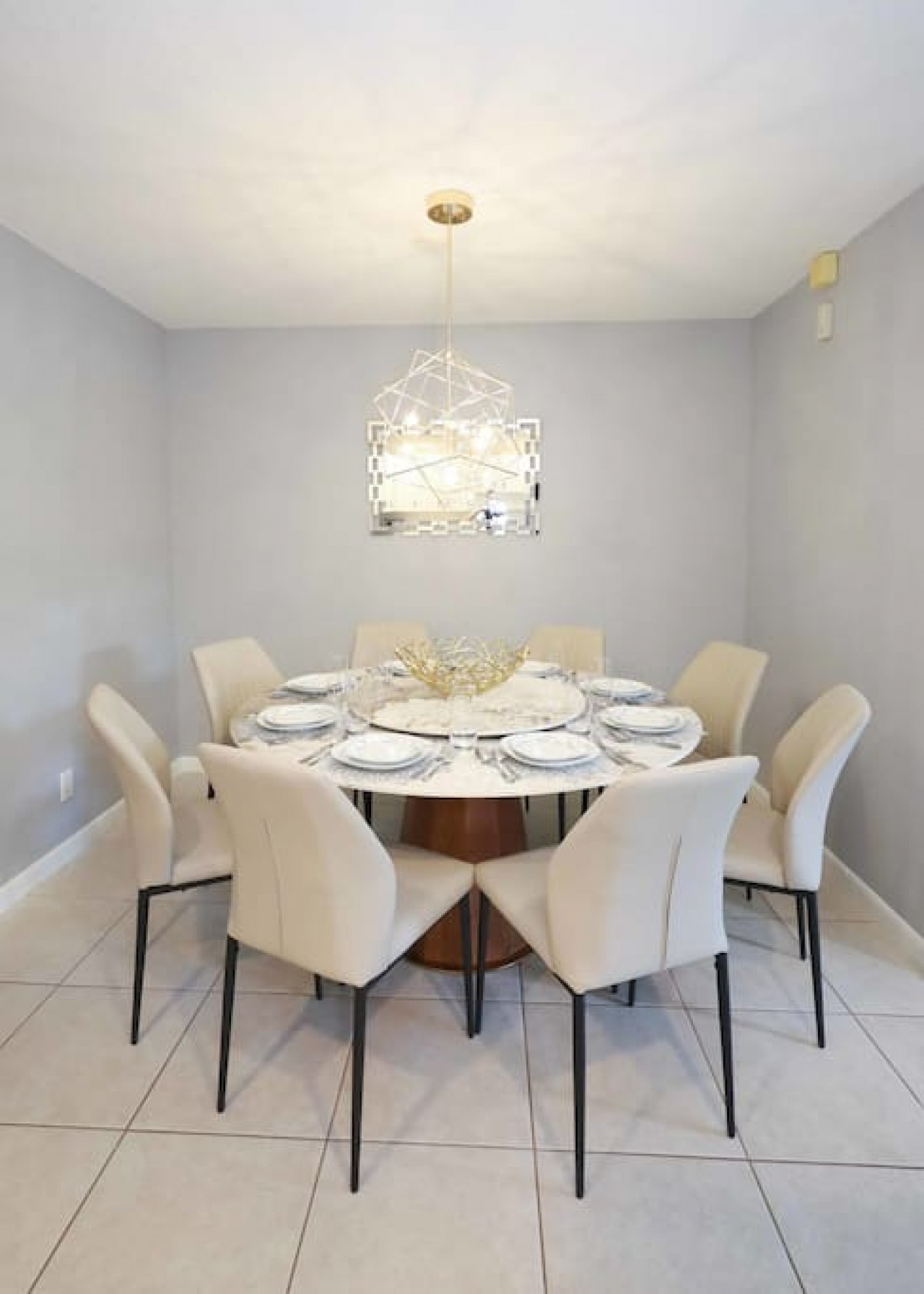 Gather around this exquisite marble top dining table to make any meal feel fancy