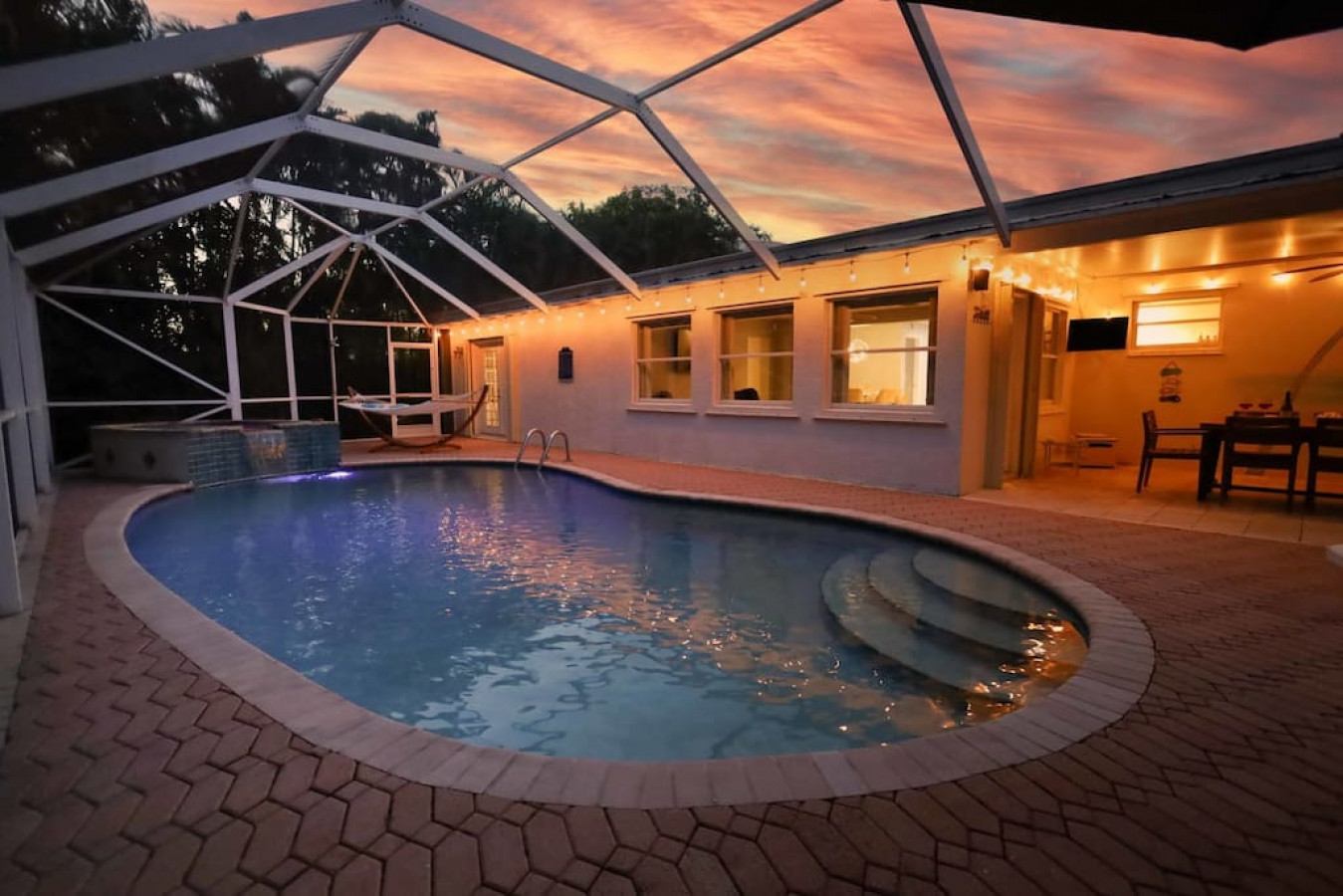 There’s nothing like sipping wine on the pool deck under a cotton candy Florida sunset