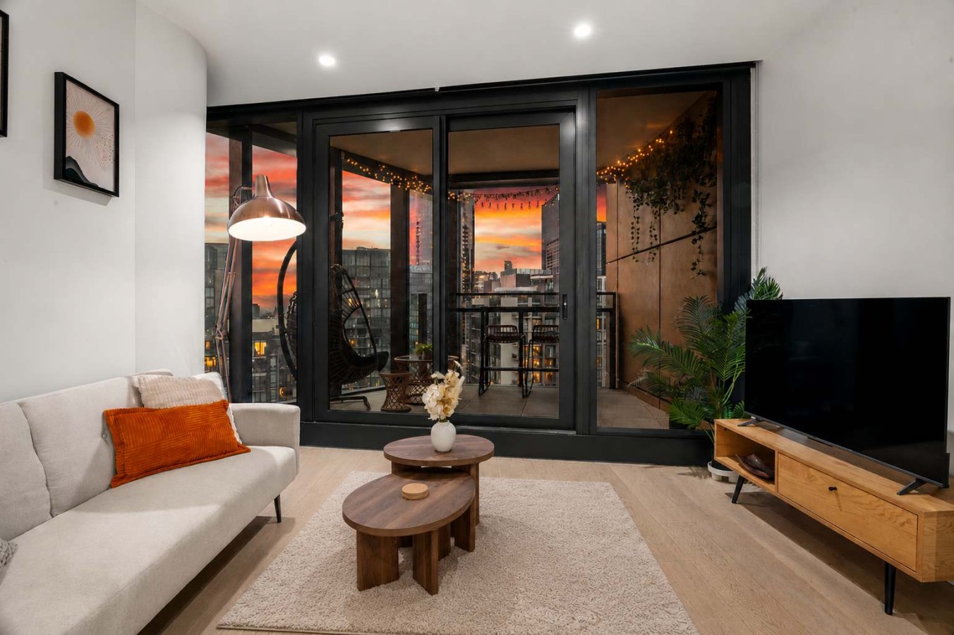 Skyline 2BR Sunset Retreat · Balcony Bar & Views
