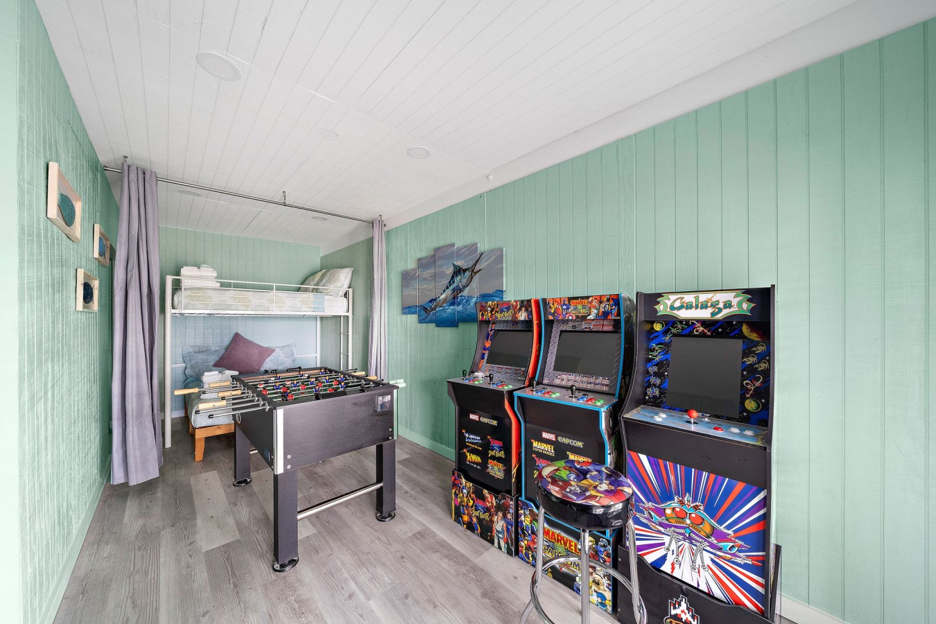 Enjoy this game room with a variety of games