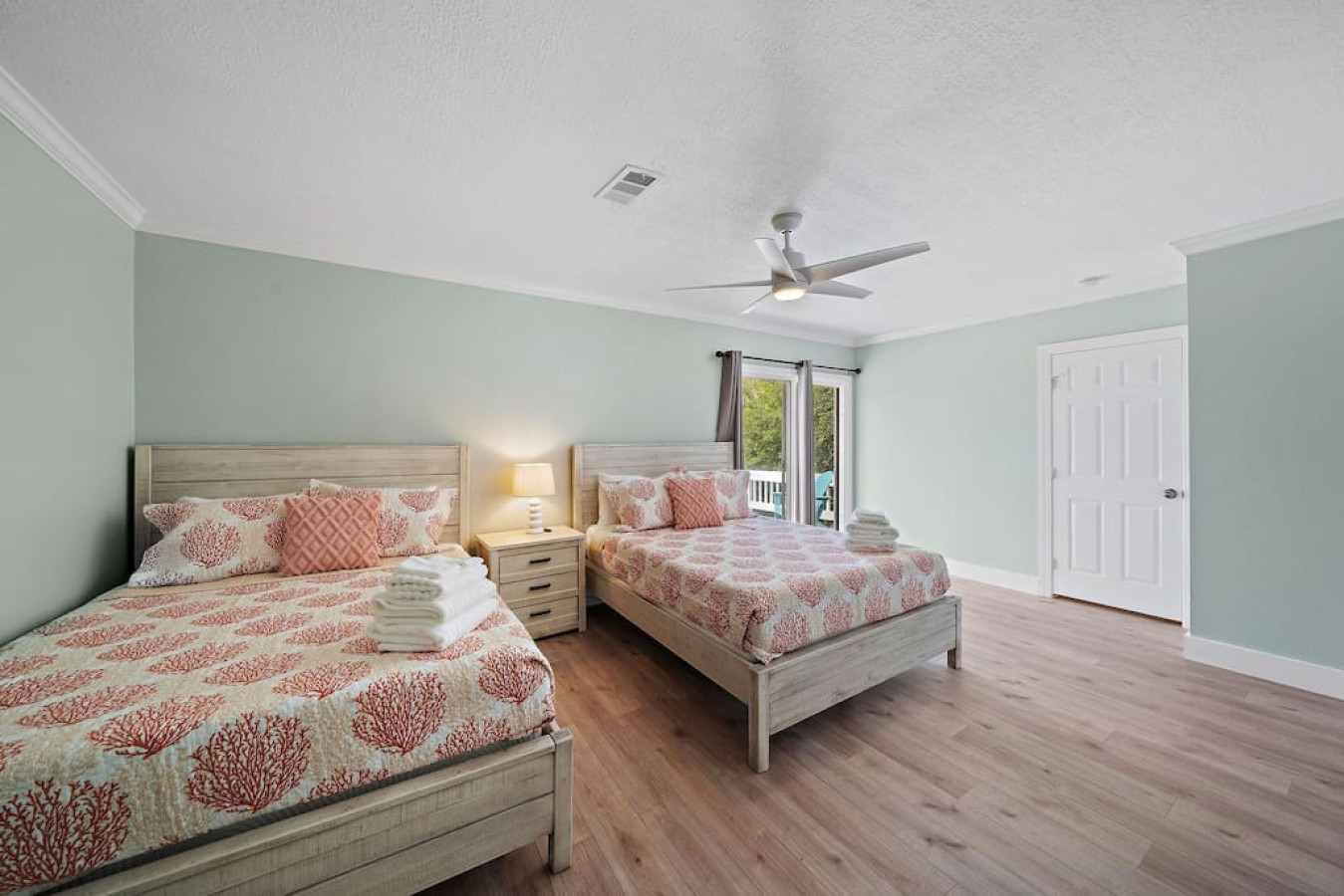 This bedroom has two queen sized beds