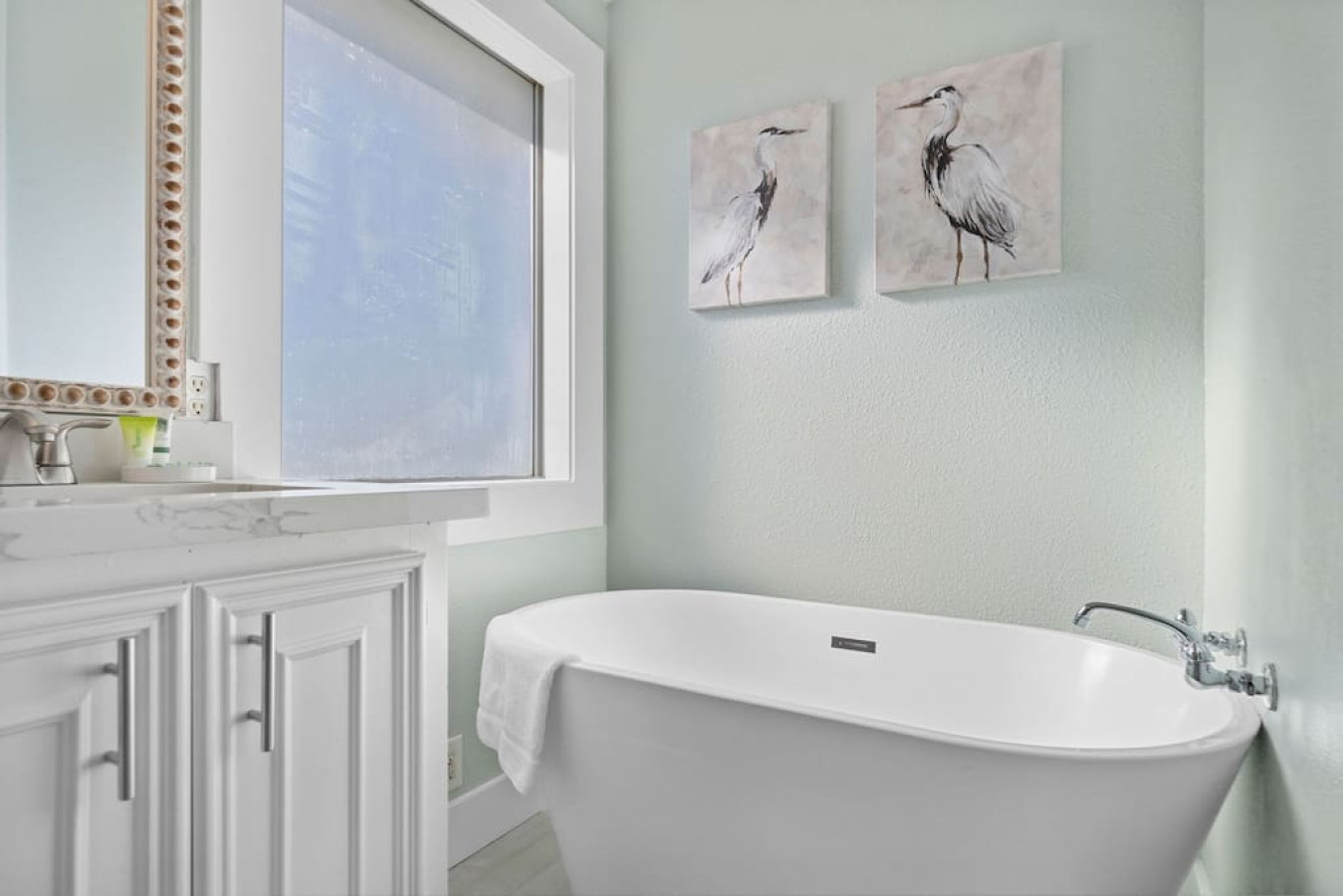Tranquil beauty meets modern repose in this stylish space