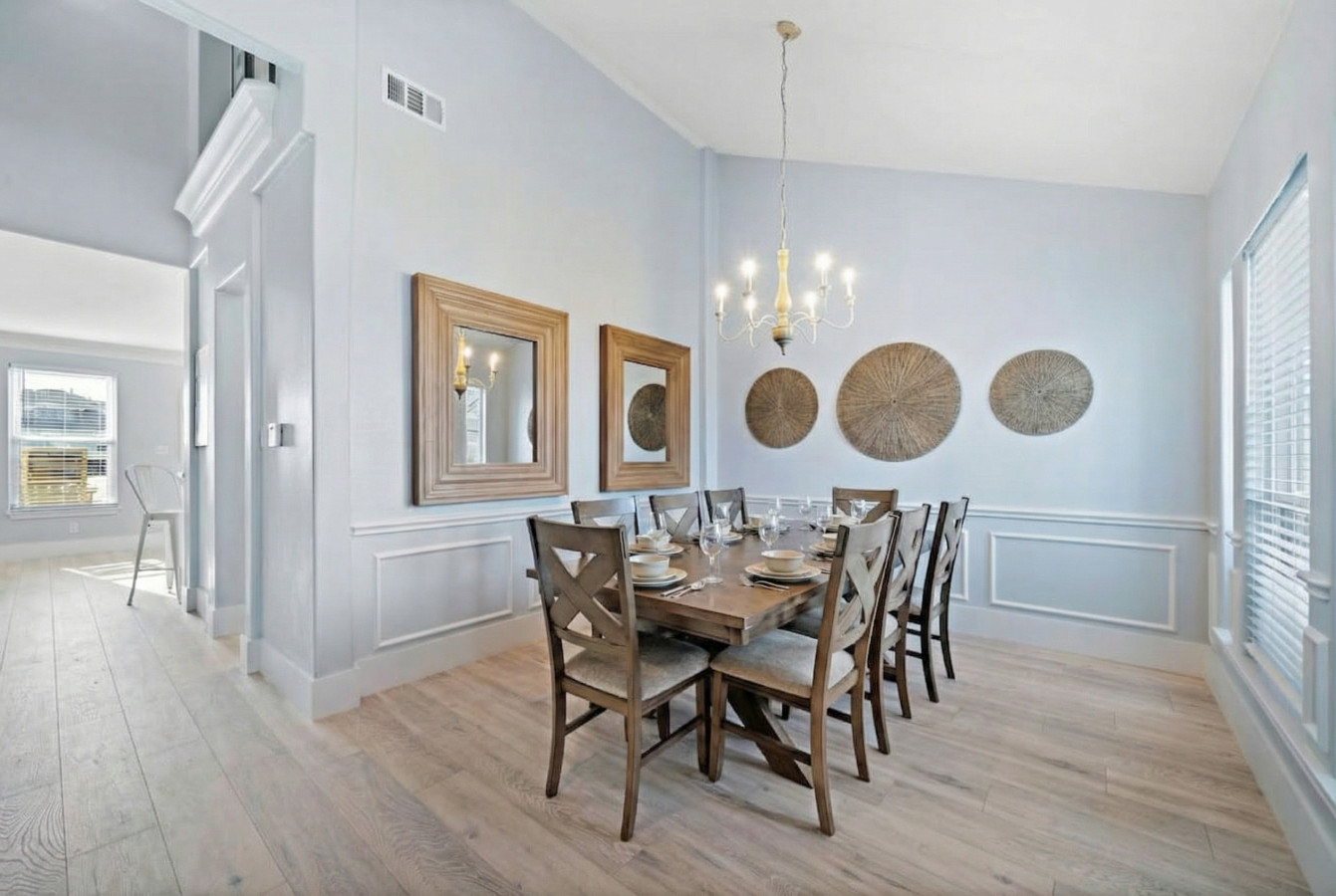Invite joy to the table in this chic and inviting dining space for 8